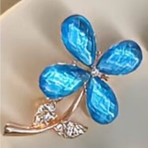 Elegant Blue and Gold Floral Brooch